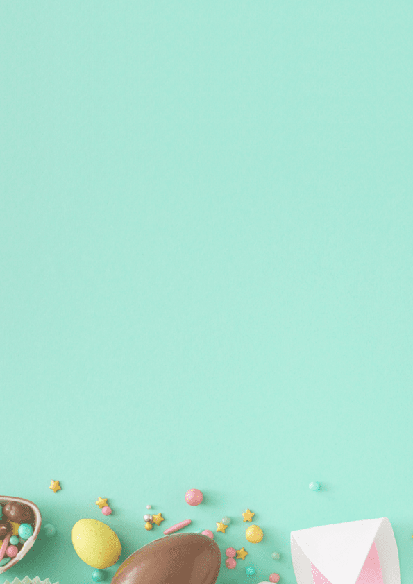 Easter sweets concept. Top view photo of easter bunny ears chocolate eggs with dragees and sprinkles on turquoise background with empty space