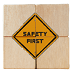 Safety symbols and first signs, work safety, caution work hazards, danger surveillance, zero accident concept on wooden cubes with beautiful grey background and copy space. Safety banner. 