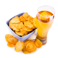 Glass of beer and chips isolated on white background
