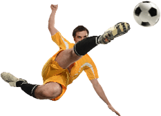 Soccer player kicking ball while jumping isolated over white background