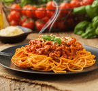 Delicious spaghetti served on a black plate