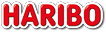 A red and white sign that says Haribo. Description generated by AI
