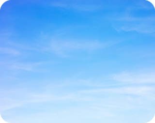 A clear blue sky with no clouds. Description generated by AI