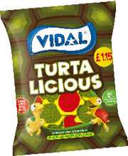 A green and yellow package of Vital Turtle Licious candy. Description generated by AI