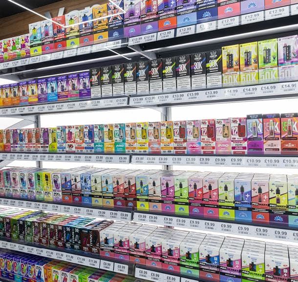 A store with a large display of cigarettes. Description generated by AI