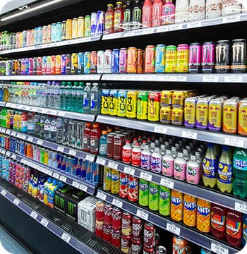 A store with a large selection of drinks. Description generated by AI