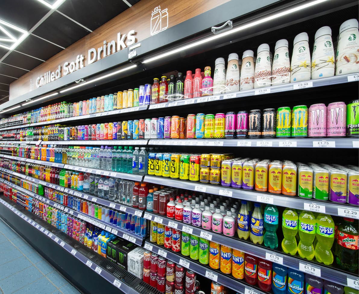 A store with a large selection of soft drinks. Description generated by AI