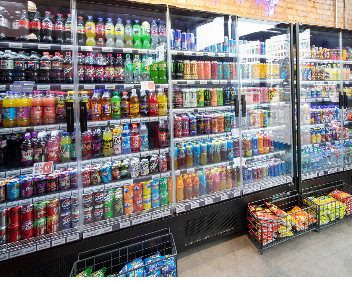 A cooler with a lot of drinks in it. Description generated by AI