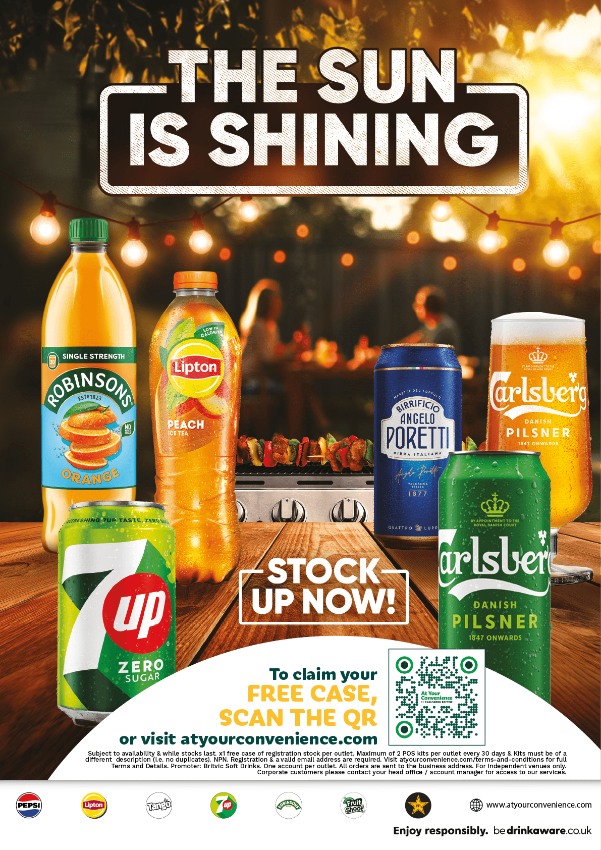 Bottles and cans of various beverages including Robinsons Orange, Lipton Peach, 7UP Zero Sugar, Angelo Poretti beer, and Carlsberg Pilsner are displayed on a wooden table with a grill and blurred people in the background under string lights and the text “The Sun Is Shining" above. Description generated by AI