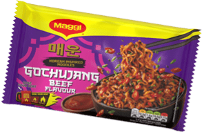 A colorful package of Maggi Korean inspired Gotchujang beef flavored noodles with an image of cooked noodles garnished with chili and green herbs being picked up with chopsticks. Description generated by AI
