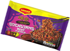 A package of Maggi Korean inspired noodles in gochujang beef flavor with an image of spicy noodles in a black bowl on the front. Description generated by AI