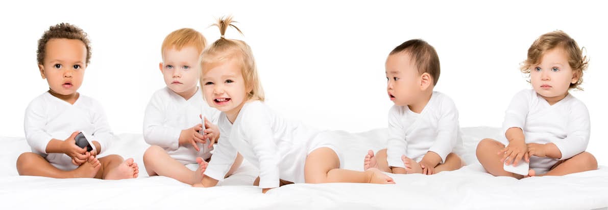 cute multicultural toddlers holding smartphones isolated on white
