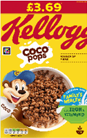 A colorful Kellogg's Coco Pops cereal box features a cartoon monkey holding a bowl of chocolate cereal with text highlighting it as a source of fiber and supporting family health with iron and vitamin D. Description generated by AI