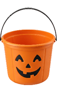 An orange plastic bucket with a black handle features a carved jack-o'-lantern face with triangular eyes, a nose, and a smiling mouth. Description generated by AI
