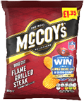 A red and black bag of McCoy's ridge cut flame grilled steak flavored potato crisps with a promotional offer to win a trip to the Super Bowl and cash prizes. Description generated by AI