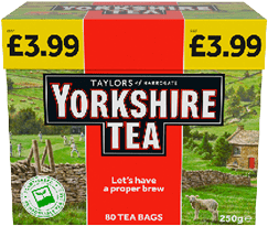 A box of Yorkshire Tea with a countryside scene featuring stone walls, sheep, and people in the background, labeled with the price and containing 80 tea bags. Description generated by AI