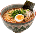 A bowl of ramen noodles topped with sliced meat, chopped green onions, a soft-boiled egg, and a sheet of seaweed. Description generated by AI